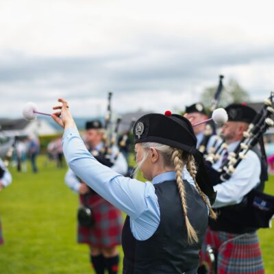 Band playing in a field