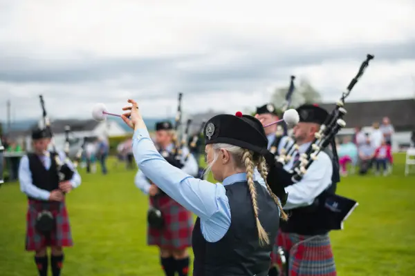 Band playing in a field